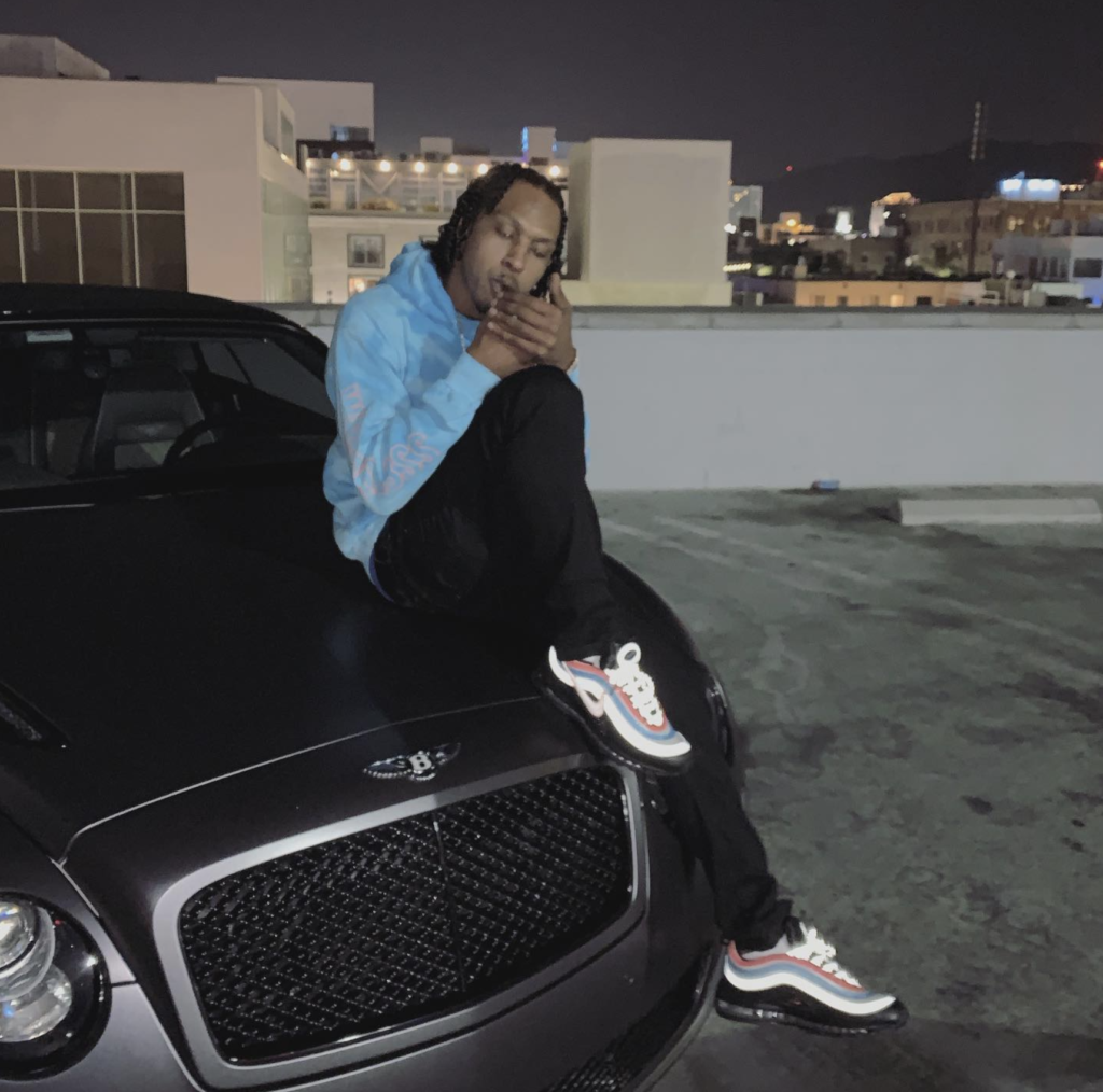 Flow187, rapper and founder of Potent Roots